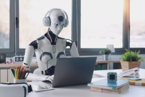 Robot using a computer to illustrate the myth of AI detecting AI-written content